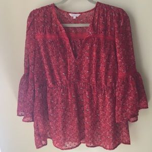 Red floral blouse